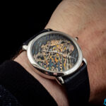 Cartier Métiers d’Art Straw and Gold Marquetry Panther, on the wrist