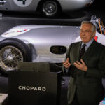 Karl-Friedrich Scheufele behind the wheel of Sir Stirling Moss’ racing car and wristed Chopard Mille Miglia Classic Chronograph Speed Silver