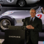 Karl-Friedrich Scheufele behind the wheel of Sir Stirling Moss’ racing car and wristed Chopard Mille Miglia Classic Chronograph Speed Silver