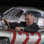 Karl-Friedrich Scheufele behind the wheel of Sir Stirling Moss’ racing car and wristed Chopard Mille Miglia Classic Chronograph Speed Silver